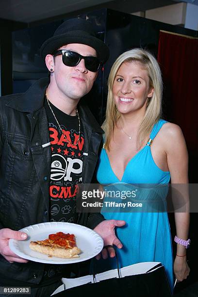 Musician Joel Madden and Melanie Segal pose at the Melanie Segal's Hollywood Platinum Lounge for the MTV Movie Awards Day One at The W Hotel on May...
