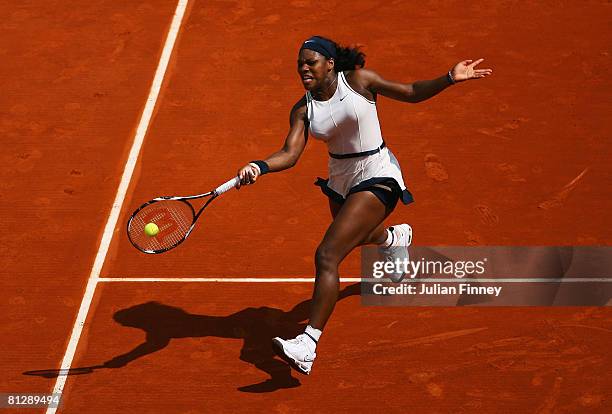 Serena Williams of USA volleys during the Women's Singles third round match against Katarin Srebotnik of Slovenia on day six of the French Open at...