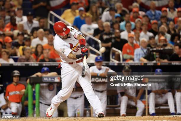 Yadier Molina of the St. Louis Cardinals and the National League hits a solo home run in the sixth inning against the American League during the 88th...