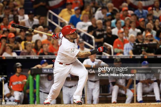 Yadier Molina of the St. Louis Cardinals and the National League reacts after hitting a solo home run in the sixth inning against the American League...