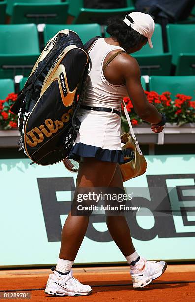 Defeated Serena Williams of USA walks off court after the Women's Singles third round match Katarin Srebotnik of Slovenia against on day six of the...