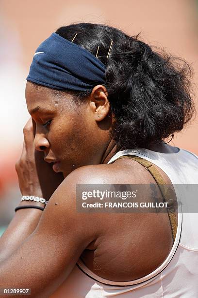 Player Serena Williams reacts during a match with Slovak player Katarina Srebotnik during the third round of the French Tennis Open, at Roland...