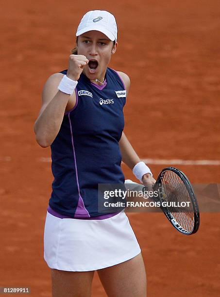 Slovak player Katarina Srebotnik reacts after a shot to US player Serena Williams during the third round of the French Tennis Open, at Roland Garros,...