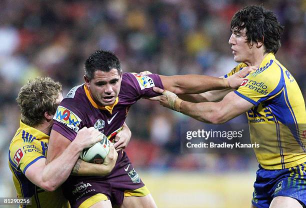 Corey Parker of the Broncos attempts to break through the Eels defence during the round 12 NRL match between the Brisbane Broncos and the Parramatta...