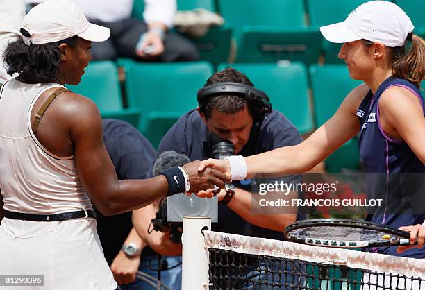 Player Serena Williams shakes hands with Slovenian player Katarina Srebotnik during the third round of the French Tennis Open, at Roland Garros, in...