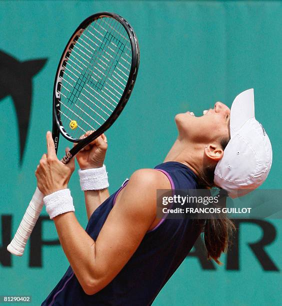 Slovenian player Katarina Srebotnik reacts after beating US player Serena Williams during the third round of the French Tennis Open, at Roland...