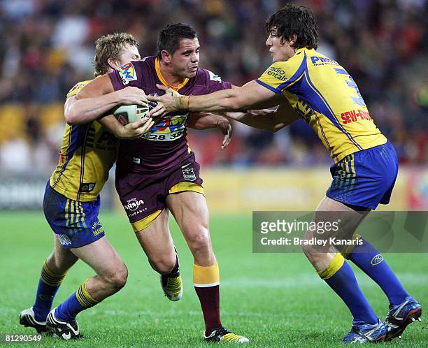Corey Parker of the Broncos takes on the Eels defence during the round 12 NRL match between the Brisbane Broncos and the Parramatta Eels at Suncorp...