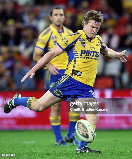 Brett Finch of the Eels attempts to kick a field goal to win the match during the round 12 NRL match between the Brisbane Broncos and the Parramatta...