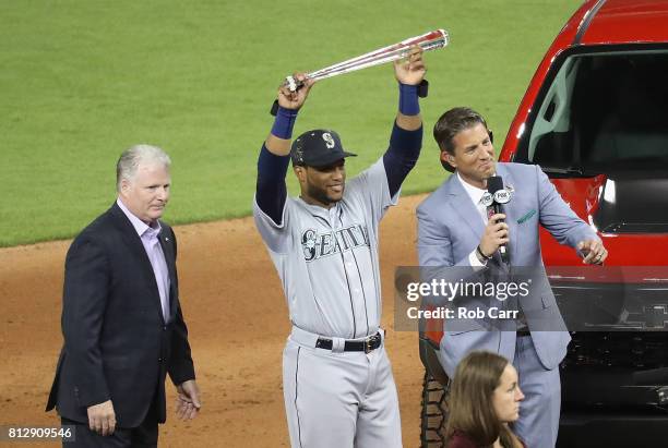 Robinson Cano of the Seattle Mariners and the American League celebrates with the Major League Baseball All-Star Game Most Valuable Player Award...