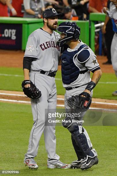 Andrew Miller of the Cleveland Indians and the American League and Gary Sanchez of the New York Yankees and the American League celebrate defeating...
