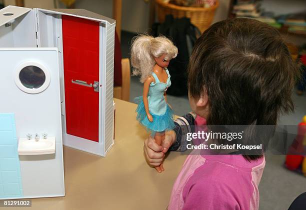 Child plays with a toy on May 30, 2008 in Wuppertal-Barmen, Germany. Unicef, United Nation's Children's Fund reports an alarming increase of child...