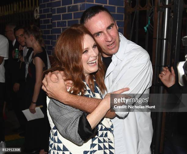 Julianne Moore and designer Raf Simons attend the Raf Simons - Front Row/Backstage at NYFW: Men's July 2017 on July 11, 2017 in New York City.