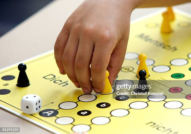 Children play a game at the Wuppertal Tafel on May 30, 2008 in Wuppertal-Barmen, Germany. Unicef, United Nation's Children's Fund reports an alarming...