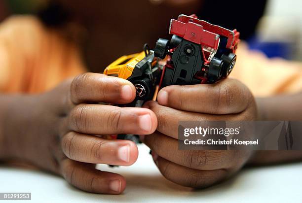 Child plays with toys at the Wuppertal Tafel on May 30, 2008 in Wuppertal-Barmen, Germany. Unicef, United Nation's Children's Fund reports an...