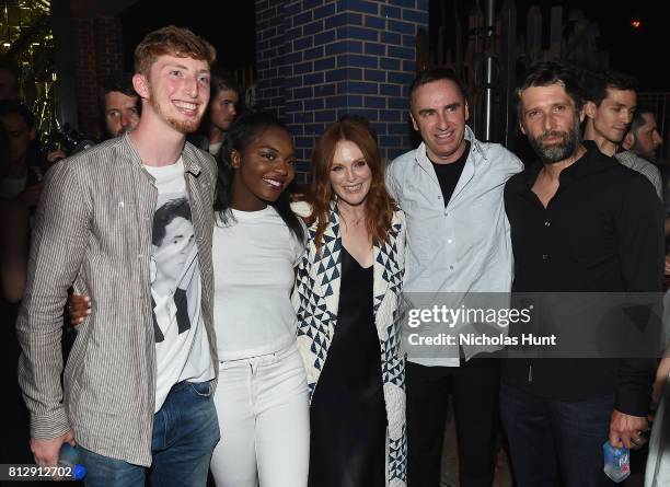 Julianne Moore and designer Raf Simons attend the Raf Simons - Front Row/Backstage at NYFW: Men's July 2017 on July 11, 2017 in New York City.