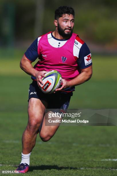 Colby Fainga'a runs with the ball during a Melbourne Rebels Super Rugby training session at Gosch's Paddock on July 12, 2017 in Melbourne, Australia.