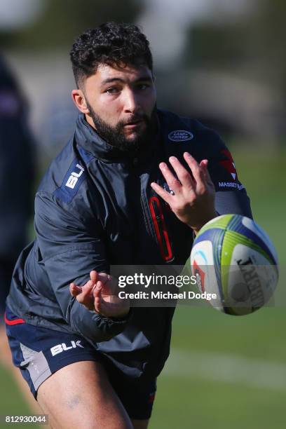 Colby Fainga'a passes the ball during a Melbourne Rebels Super Rugby training session at Gosch's Paddock on July 12, 2017 in Melbourne, Australia.