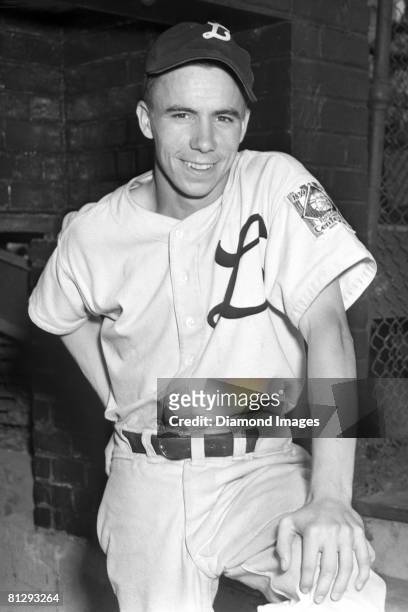 Shortstop Harold "Pee Wee" Reese of the Louisville Colonels poses for a portrait prior to a game in 1939 at Parkway Field in Louisville, Kentucky....