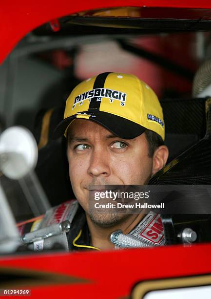 Matt Crafton, driver of the Jim Beam Dodge, sits in his car during practice for the NASCAR Sprint Cup Series Best Buy 400 at Dover International...