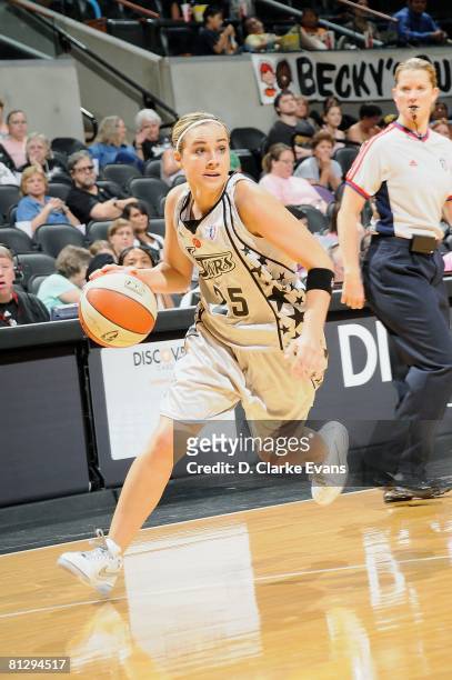 Becky Hammon of the San Antonio Silver Stars drives the ball up court during the WNBA game against the Phoenix Mercury on May 20, 2008 at the AT&T...