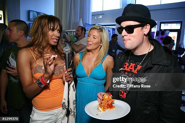 Actress Traci Bingham, Melanie Segal and Musician Joel Madden at the Melanie Segal's Hollywood Platinum Lounge for the MTV Movie Awards Day One at...