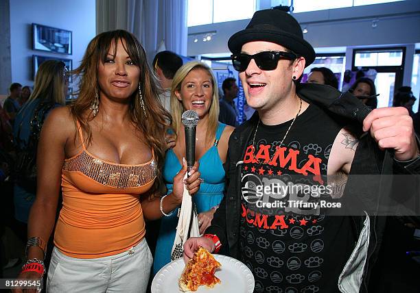 Actress Traci Bingham, Melanie Segal and Musician Joel Madden at the Melanie Segal's Hollywood Platinum Lounge for the MTV Movie Awards Day One at...