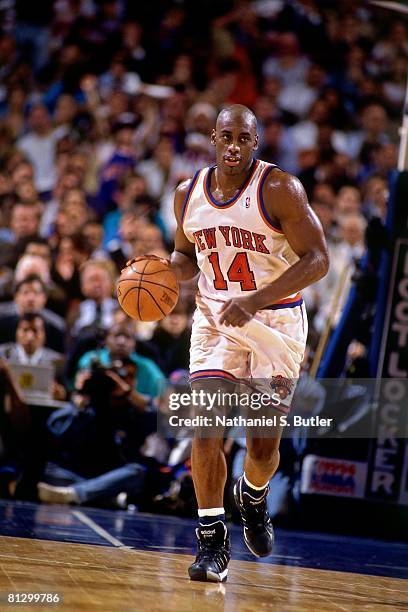 Anthony Mason of the New York Knicks moves the ball up court against the Indiana Pacers in Game One of the Eastern Conference Finals during the 1994...