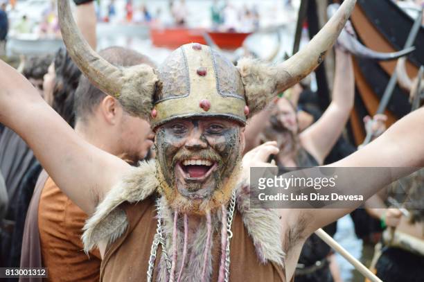 the viking landing party of catoira - viking helmet stock-fotos und bilder