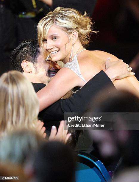 Jennifer Nettles of the band Sugarland is congratulated after winning the Single Record of the Year award for the song, "Stay" during the 43rd annual...