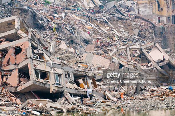 Rescuers look for survivors May 16, 2008 in Beichuan, China. 50,000 people are estimated to have been killed in the deadliest earthquake in China in...