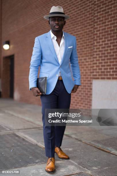 Steven Onoja is seen attending BOSS during Men's New York Fashion Week wearing Hugo Boss on July 11, 2017 in New York City.