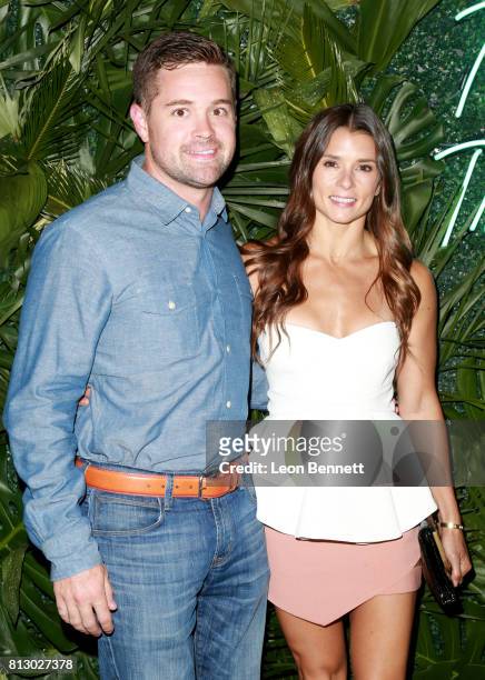 Racecar drivers Ricky Stenhouse Jr. And Danica Patrick attend The Players' Tribune Hosts Players' Night Out 2017 at The Beverly Hills Hotel on July...