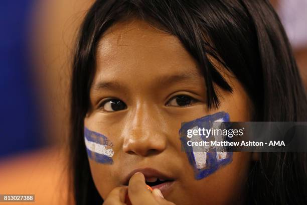 Young female fan of Honduras with a painted face during the 2017 CONCACAF Gold Cup Group A match between Honduras and French Guiana at BBVA Compass...