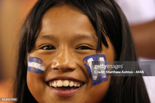 Young female fan of Honduras with a painted face during the 2017 CONCACAF Gold Cup Group A match between Honduras and French Guiana at BBVA Compass...