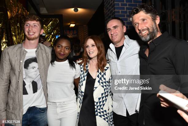 Caleb Freundlich, Guest, Julianne Moore, Designer Raf Simons and Bart Freundlich attend Raf Simons Front Row during NYFW Men's at Golden Sun Life Day...