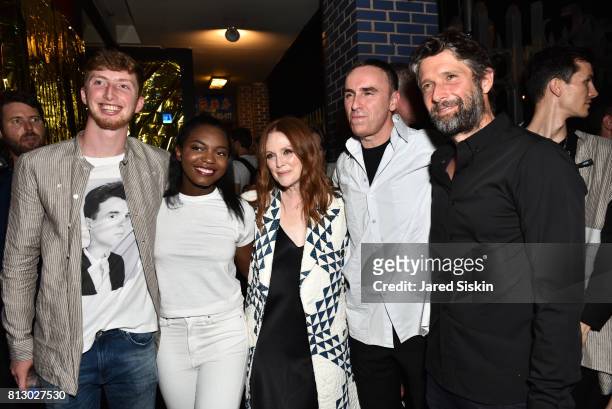 Caleb Freundlich, Guest, Julianne Moore, Designer Raf Simons and Bart Freundlich attend Raf Simons Front Row during NYFW Men's at Golden Sun Life Day...