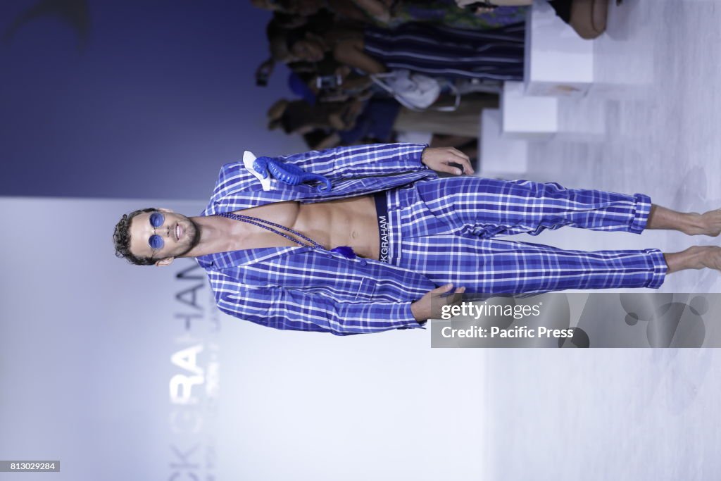 A model walks on the runway during the Nick Graham Spring/...
