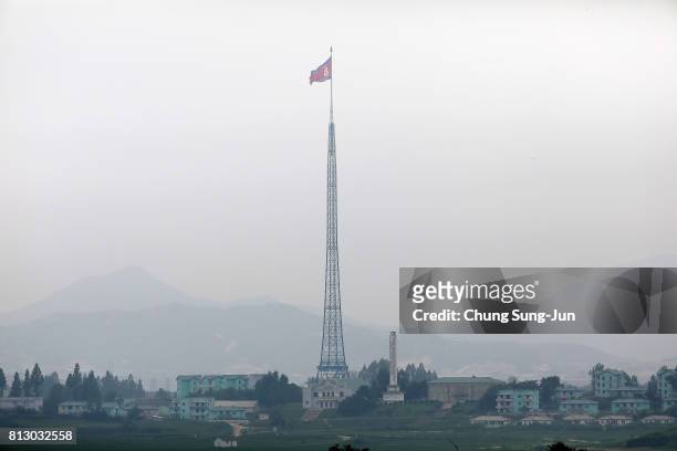 North Korean national flag in North Korea's propaganda village of Gijungdong is seen from an observation post on July 12, 2017 in Panmunjom, South...