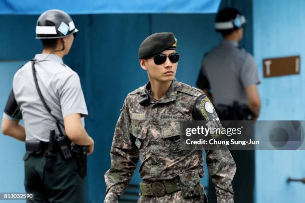 South Korean soldiers stand guard at the border village of Panmunjom between South and North Korea at the Demilitarized Zone on July 12, 2017 in...