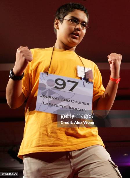 Sameer Mishra of West Lafayette, Indiana celebrates after he correctly spelled his word during round seven of the 2008 Scripps National Spelling Bee...
