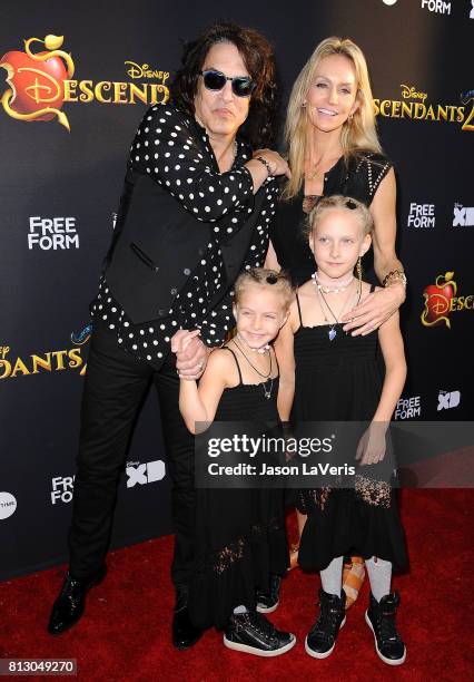 Musician Paul Stanley of the band Kiss, wife Erin Sutton and daughters Emily Grace Stanley and Sarah Brianna Stanley attend the premiere of...