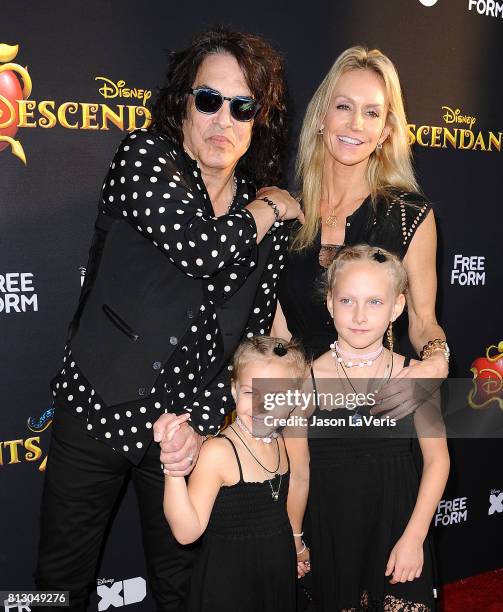 Musician Paul Stanley of the band Kiss, wife Erin Sutton and daughters Emily Grace Stanley and Sarah Brianna Stanley attend the premiere of...