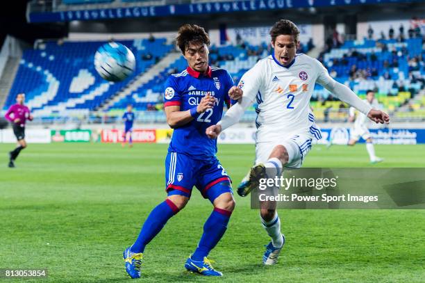 Eastern SC Defender Josh Mitchell fights for the ball with Suwon Midfielder Ko Seung-Beom during the AFC Champions League 2017 Group G match between...