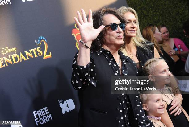 Musician Paul Stanley of the band Kiss, wife Erin Sutton and daughters Emily Grace Stanley and Sarah Brianna Stanley attend the premiere of...