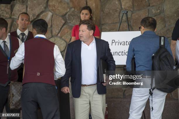 Robert Kotick, president and chief executive officer of Activision Blizzard Inc., center, arrives for the Allen & Co. Media and Technology Conference...