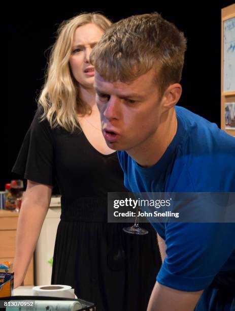 Amy Morgan as Dee and Matthew Aubrey as Sam perform on stage during performance of the 'Touch' a new play written and directed by Vicky Jones at Soho...