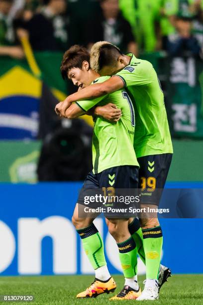 Jeonbuk Hyundai Motors FC midfielder Kim Bo Kyung reacts with Jeonbuk Hyundai Motors FC forward Kim Shin Wook during the AFC Champions League 2016...