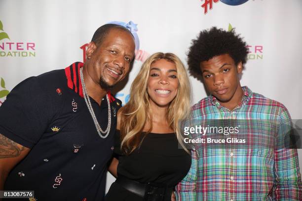 Kevin Hunter, wife Wendy Williams and son Kevin Hunter Jr pose at a celebration for The Hunter Foundation Charity that helps fund programs for...