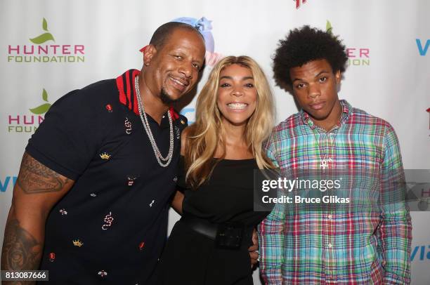 Kevin Hunter, wife Wendy Williams and son Kevin Hunter Jr pose at a celebration for The Hunter Foundation Charity that helps fund programs for...