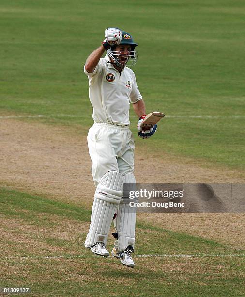 Simon Katich of Australia celebrates reaching his century during day one of the Second Test match between West Indies and Australia at Sir Vivian...